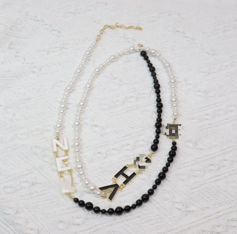 

Pendant Necklaces High quality designer classic luxury new black and white pearl classic sweater chain fashion temperament super versatile