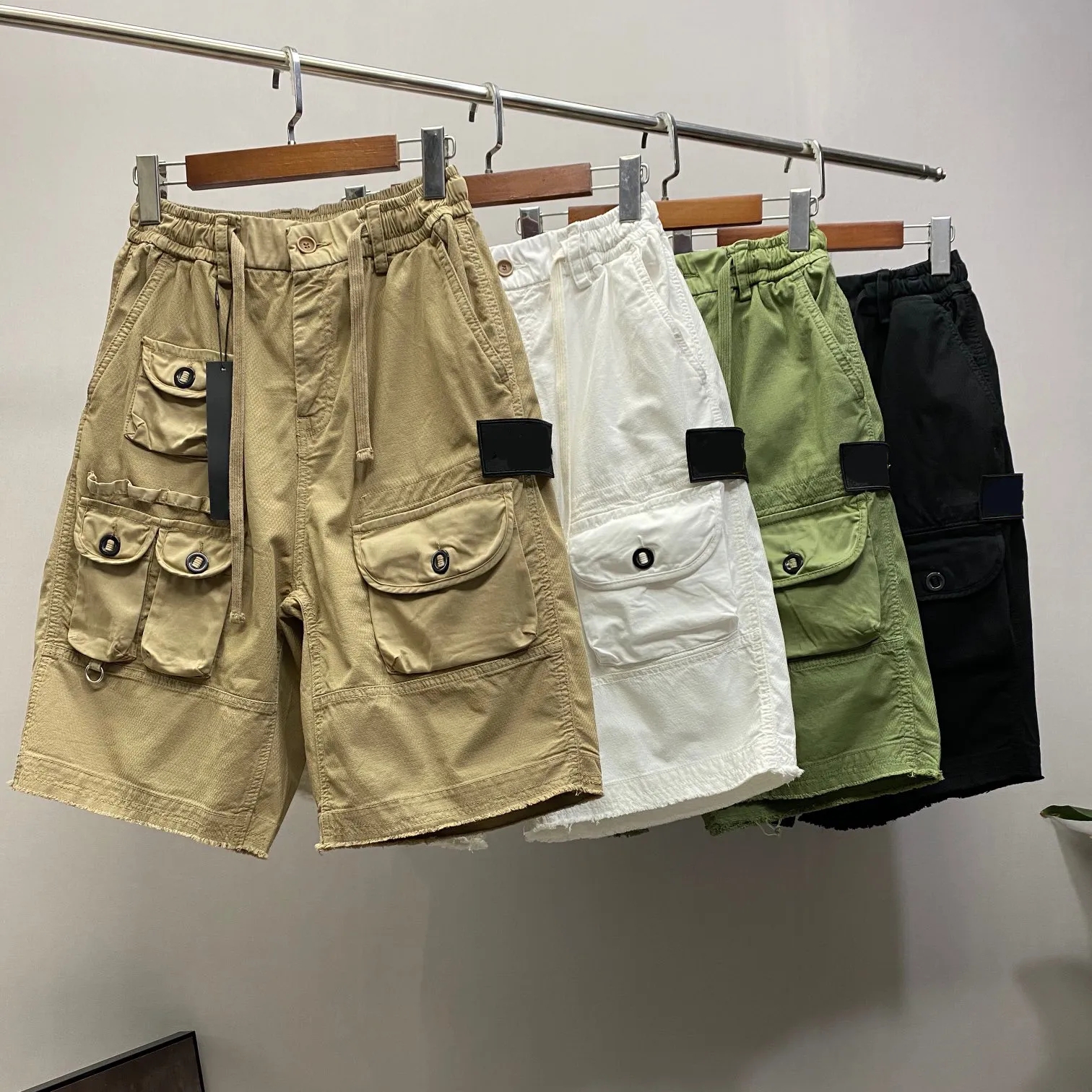 

Mens Shorts Designer Embroidered Pockets Men Stone island Loose Casual Sweatpants Summer Short Knee Lenth Woman Clothing Multicolor