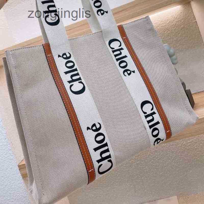 

Cloe 2023 Woody Tote Bag Designer Hands Bags outlet Handbag Fashion Japanese Single Shoulder Canvas Niche Design Portable Large Tote Women's Capac 7AW2
