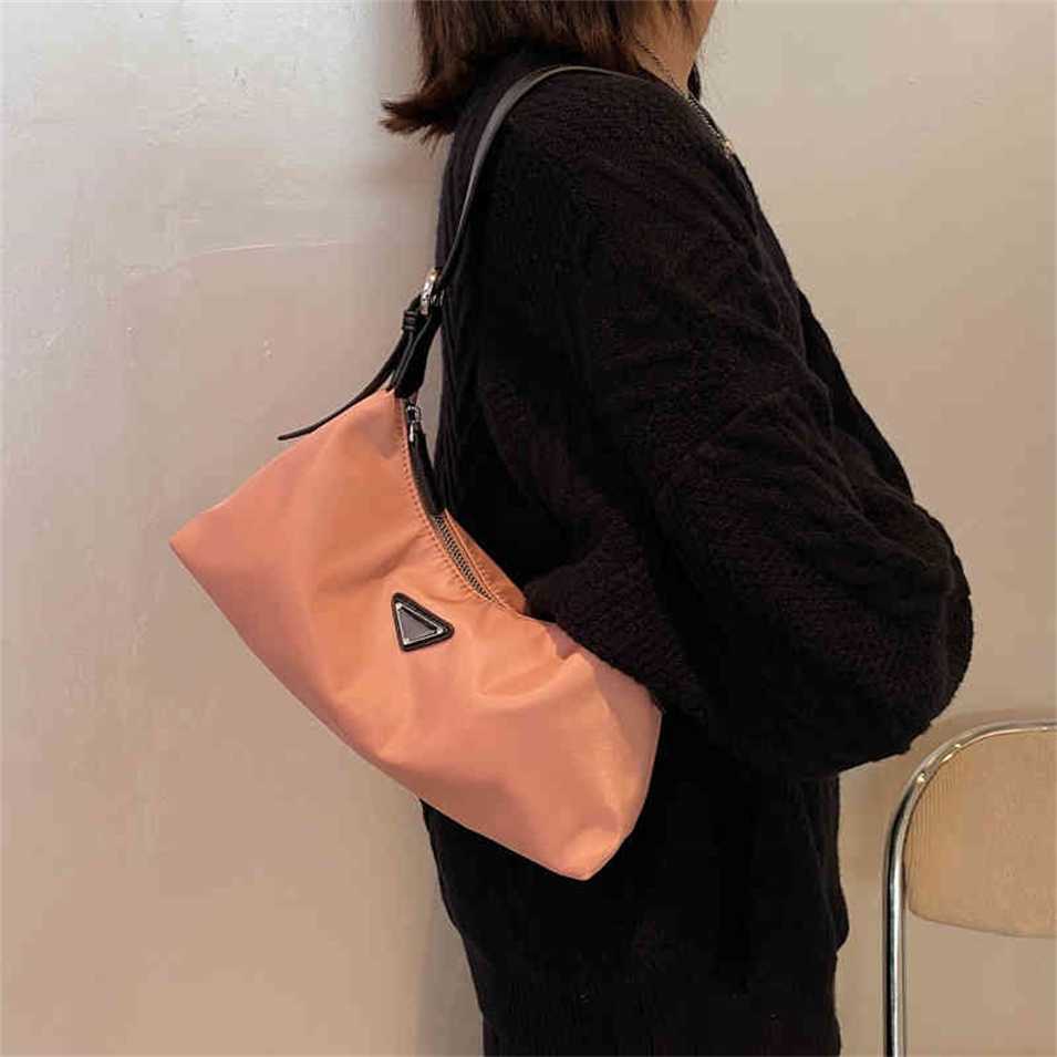 

2023 Designer bag female autumn fashion portable small black leisure nylon cloth single shoulder armpit bag, Yellow9