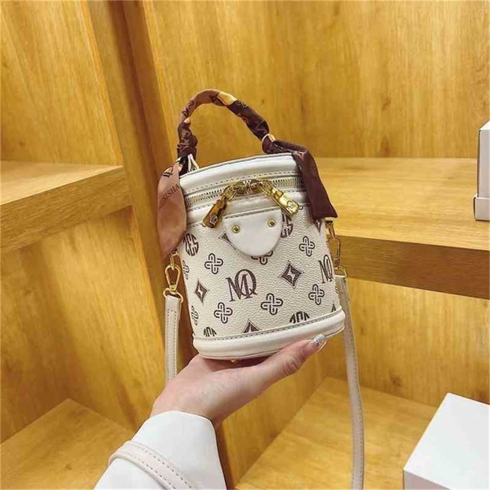 

2023 Designer bag super low Silk old flower spring style texture niche bucket bag popular silk scarf Fashion Pendant, White1