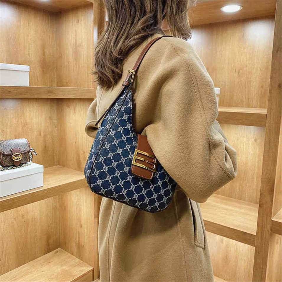 

2023 Designer bag Vintage old flower printing bucket 2023 autumn new texture single shoulder fashionable Street messenger armpit bag, Blue