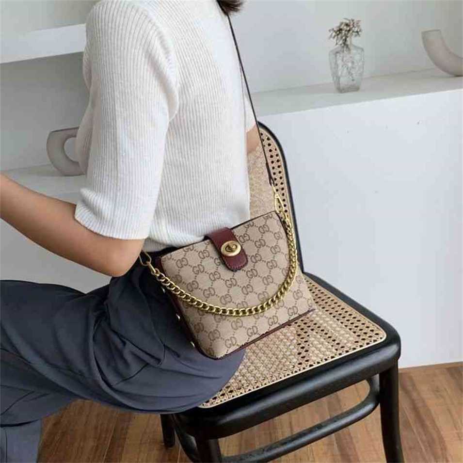 

2023 Designer bag Super Printed bucket bag women's summer versatile ins sense of Portable Single Shoulder Bag Small, Sky blue