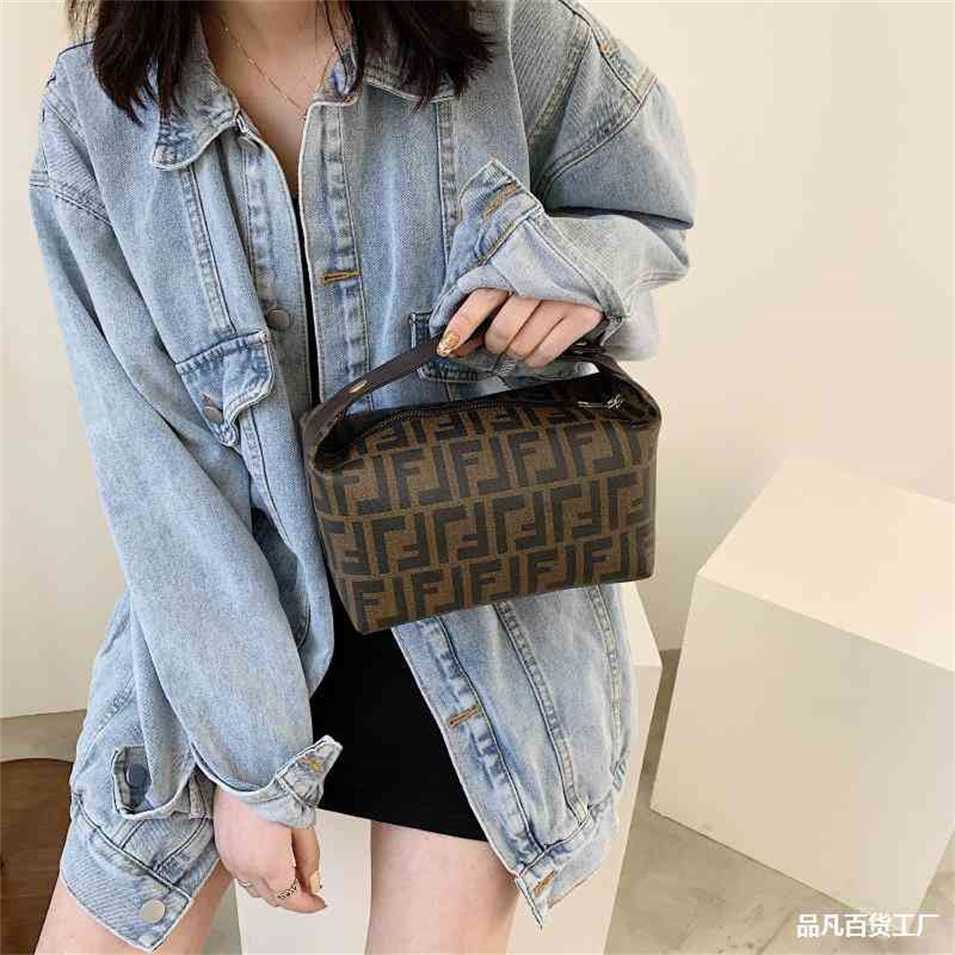 

2023 Designer bag Portable cosmetic bag women's large capacity storage 2023 new super fire toiletries travel 2023 large suitcase, M model