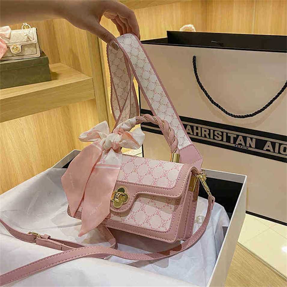 

2023 Designer bag Handbag handbag French sense niche women's embossed wide strap foreign style versatile messenger Single HandbagMHJP, Coffee