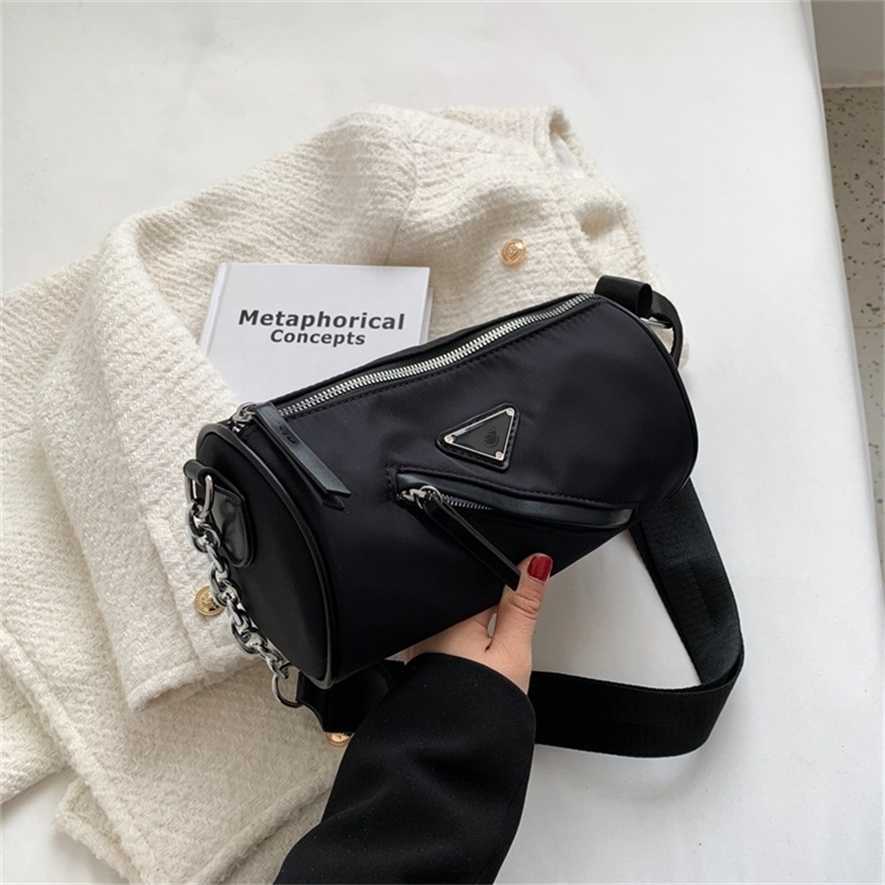 

2023 Designer bag Simple leisure small women's 2023 new fashion chain single shoulder personalized zipper messenger cylindrical bag OEPS, Black4
