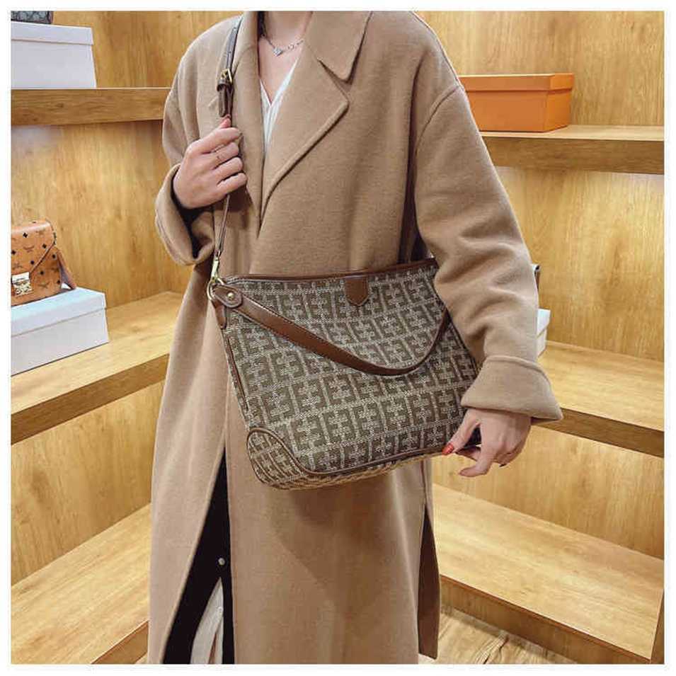 

2023 Designer bag Handbags On autumn winter red tote fashion armpit texture portable large capacity, Dark brown