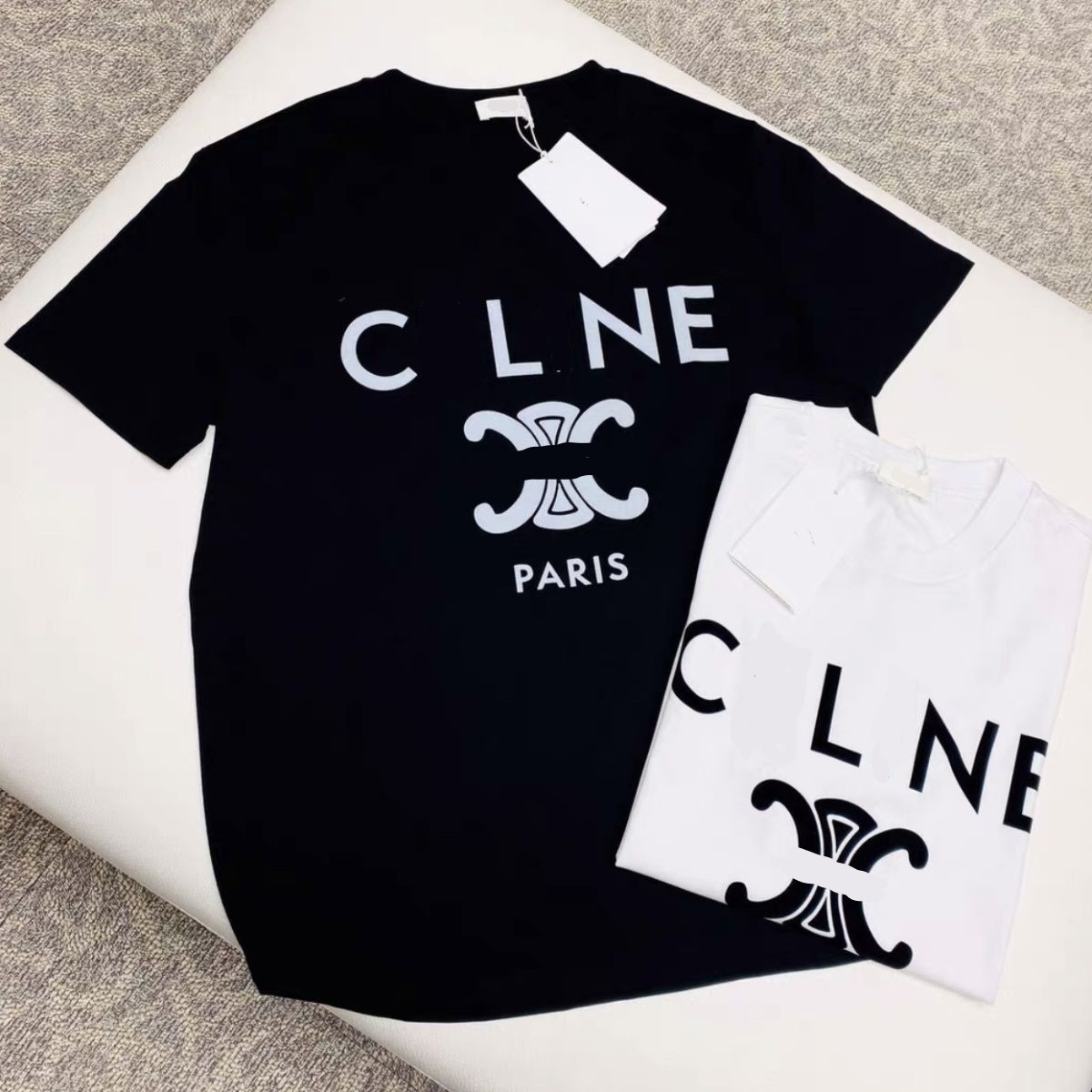 

2023 Mens Tees Elegant New Cotton Couple Short Sleeve Arc Triomphe Fashion Versatile Letter Print Round Neck T-shirt Loose Solid Bottom, White