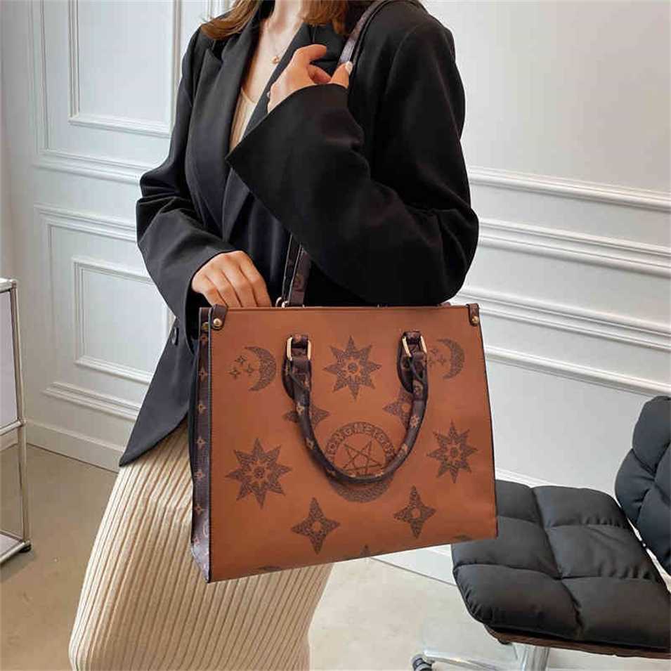 

2023 Designer bag Autumn and new fashion jungle fan Laohua foreign style one shoulder large capacity Tote women's bag, Brown 1