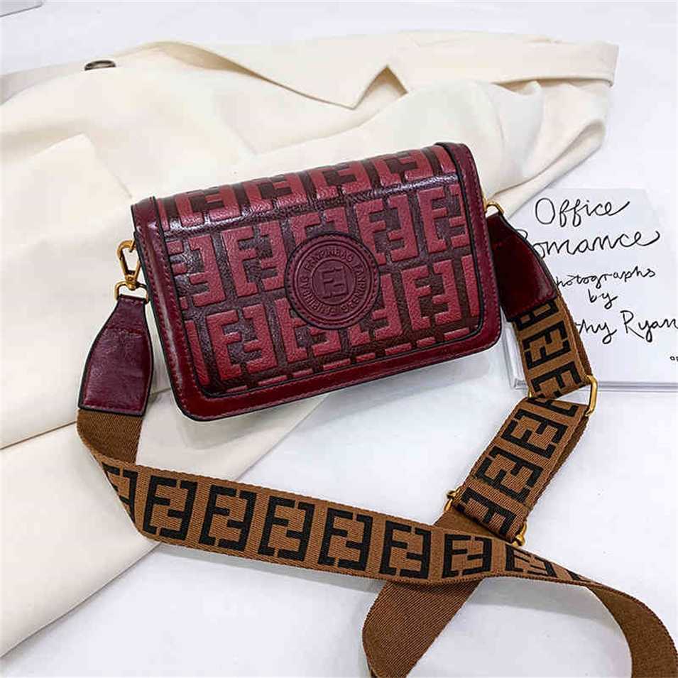 

2023 Designer bag spring and autumn compartment small square version indentation fashion single bag wide shoulder belt, Blue