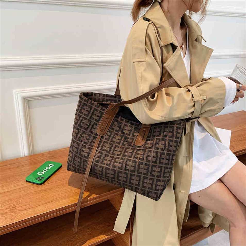 

2023 Designer bag handbag Bag female single shoulder bag armpit Commuter versatile travel, Brown5