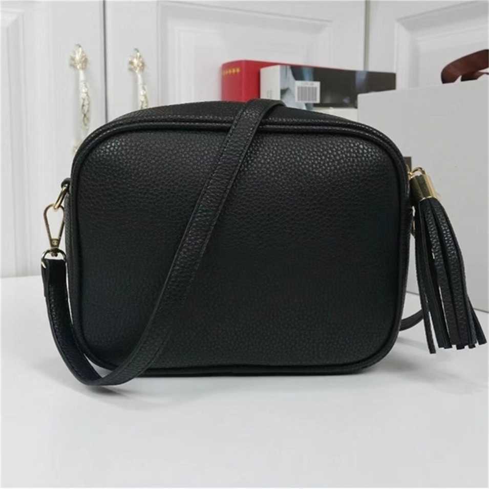 

2023 Designer bag Handbag Girl's small round litchi pattern messenger women's one tassel shopping, White13