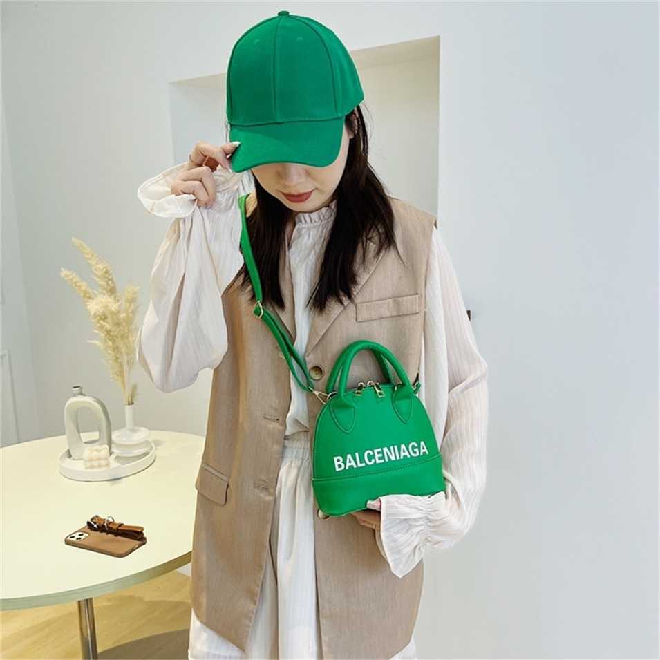 

2023 Designer bag Handbag trendy shell candy color letter hat matching women's Messenger, White9