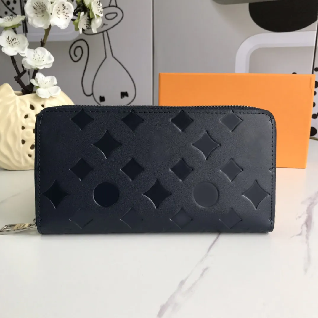 

Fashion designer wallet luxury zipper purses men women plain leather slim clutch Highs quality embossed flower letter long card holders with original box dust bags, 60017# embossed monograms-black