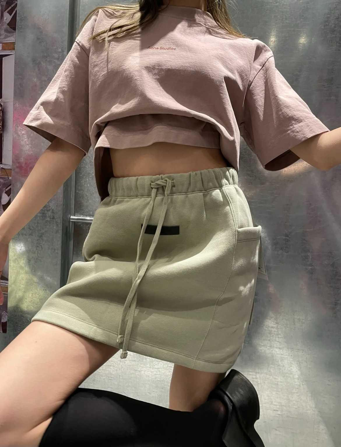 

Designer Clothing Womens Skirts Fears Of God Fog Essen Spring summer New Solid Drawstring Skirt Sport Casual Spicy Girls Knitted High Waist Sexy Wrap Hip Short Skirt, Off white terry style