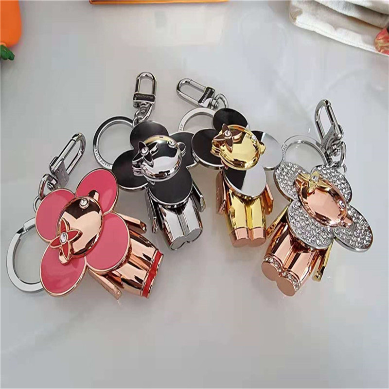 

Sunflower keychains car charm fun designer keychain hundred match bag couple charm Top quality cute panda good with box packing