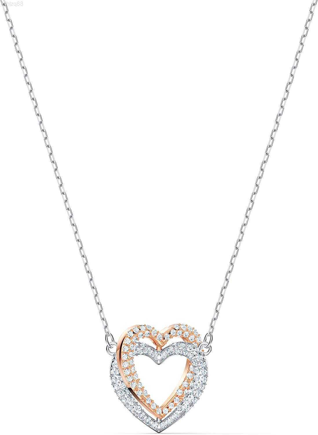 

Swarovski Infinity Heart Jewelry Collection Necklaces and Bracelets Rose Gold Rhodium Tone Finish Clear Crystals