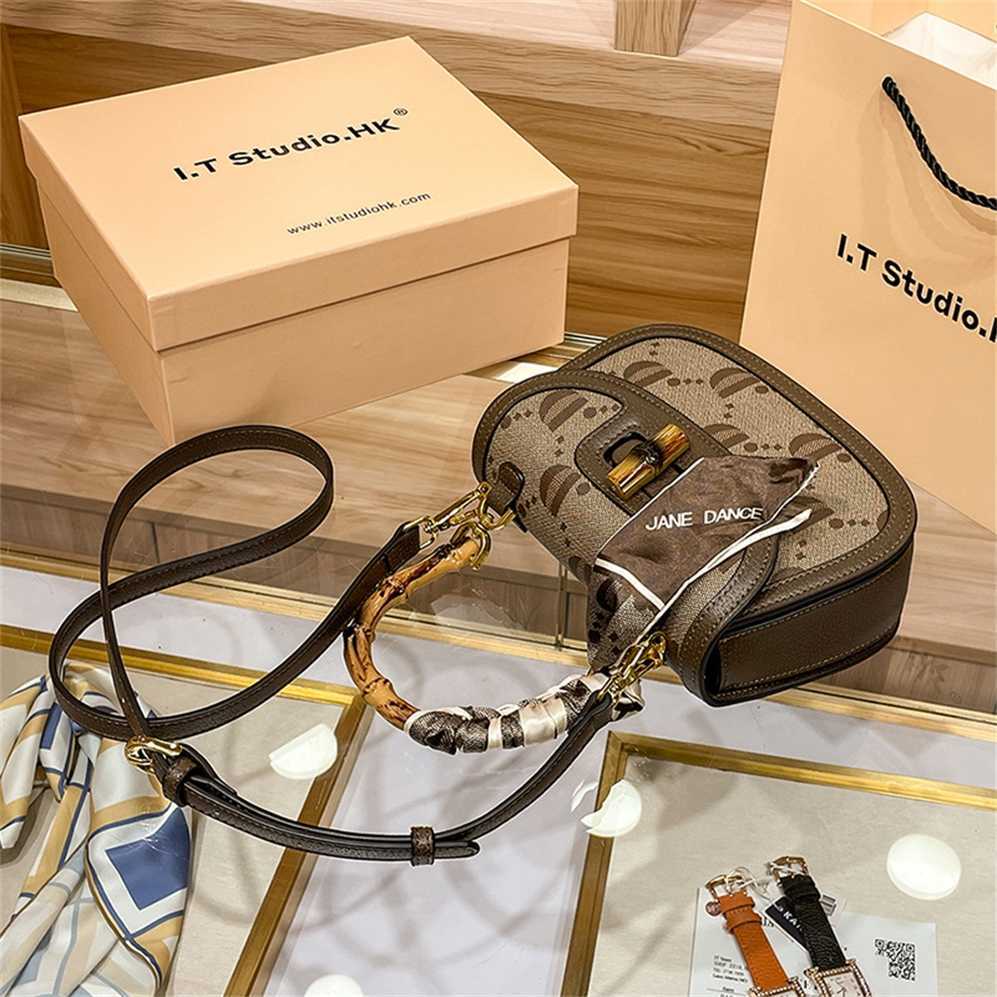 

Luxury Handbags sale Genuine leather women's bag light luxury niche high-end feeling D-letter temperament silk scarf handheld one shoulder crossbody bamboo joint