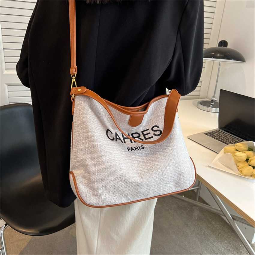 

20% OFF 2023 Fashion handbag Canvas Commuter Tote New Trend High Capacity Contrast Printed Letter Shoulder Crossbody Bag, Black8