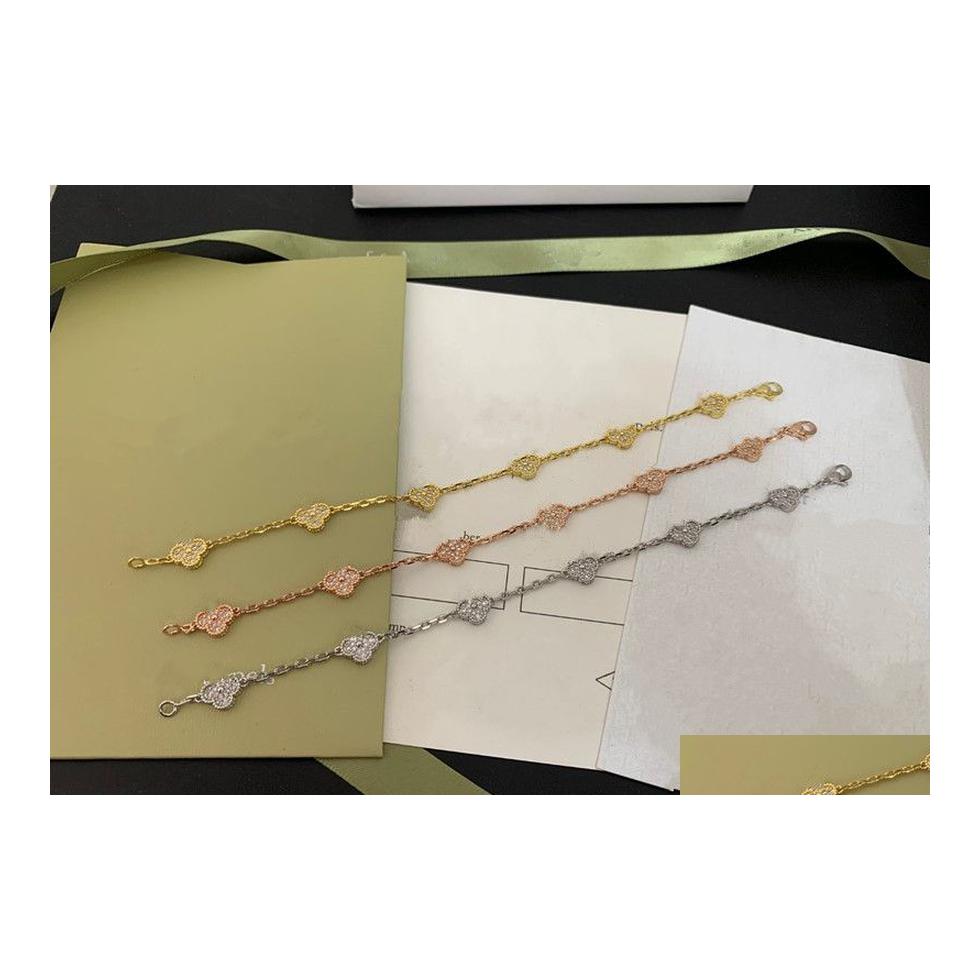 

Charm Bracelets Luxury Designer Mini Bracelet For Women 4 Four Leaf Clover 18K Gold Jewelry Agate Shell Mother Of Pearl Chain Fashio Dhm9F