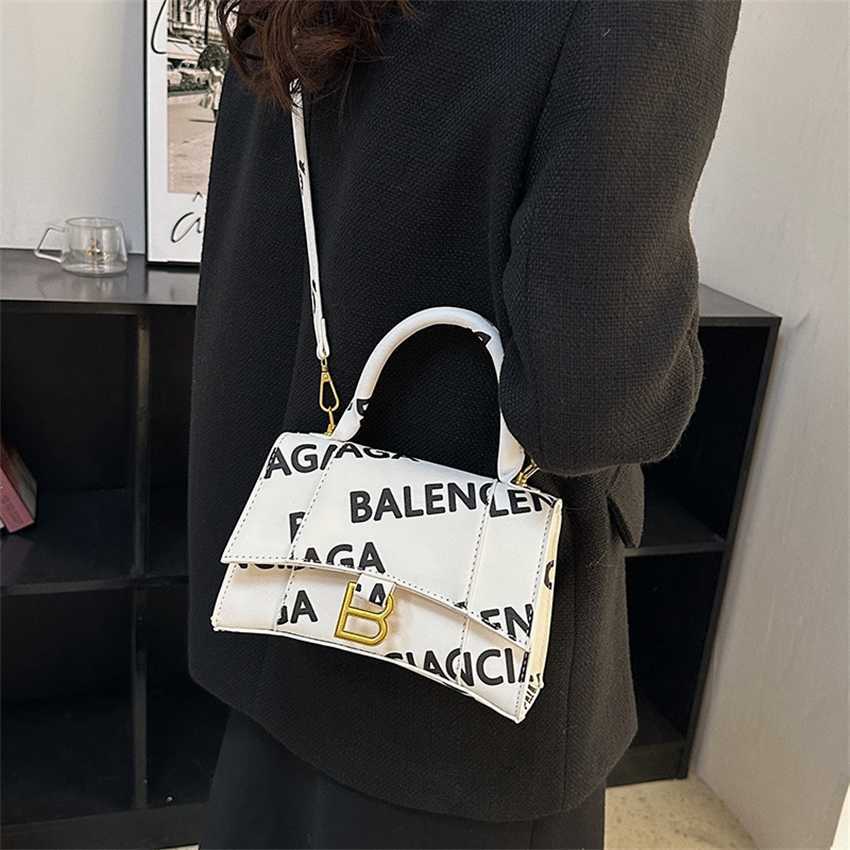 

20% OFF 2023 handbag s Women's Family Paris Letter Printing Hourglass Fashion One Shoulder Oblique Straddle Handheld Bag for Women, White13
