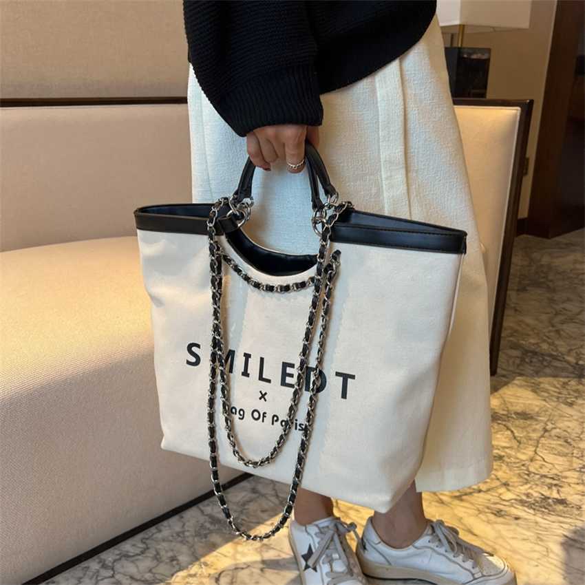 

20% OFF 2023 Fashion handbag New Women's Portable Chain One Shoulder Beach Advanced Sensible Commuter Canvas Tote Bag, Black7