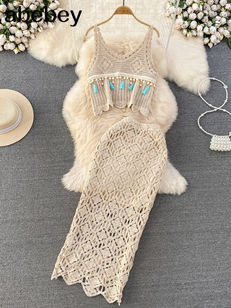 

Two Piece Dress Holiday Knitted Pisces Suits Laca Up Halter Hollow Out Backless TopDrawstring Tassel Solid Skirt Women Sets 230509, Beige