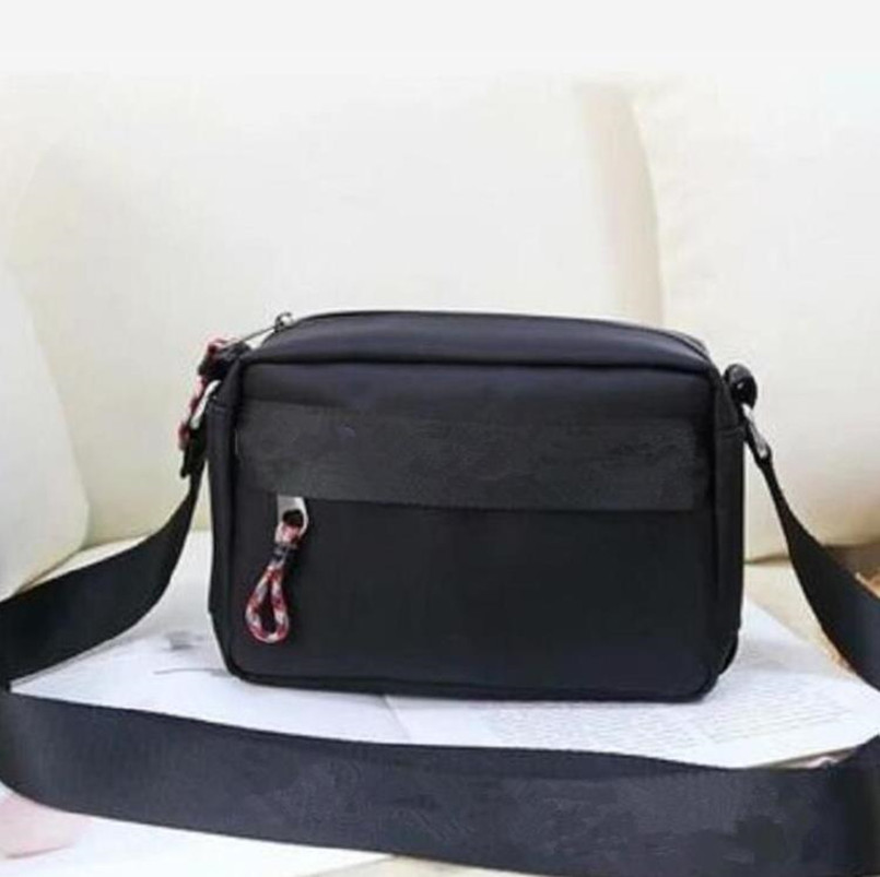 

2023 designer black messenger bag high quality men's nylon camera bag fashion men's and women's shoulder bag Size 22 cm, Waist bags