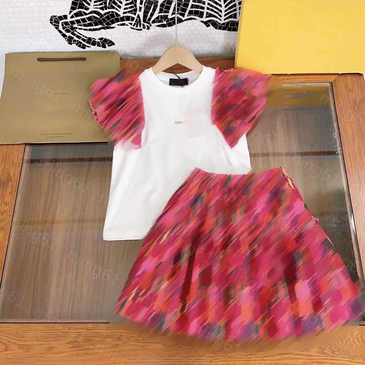 

23ss t shirt Skirt suit kid sets kids designer clothes Round neck Pure cotton Spliced lace sleeve Short sleeve t-shirt full logo print Half skirt suits kids clothes