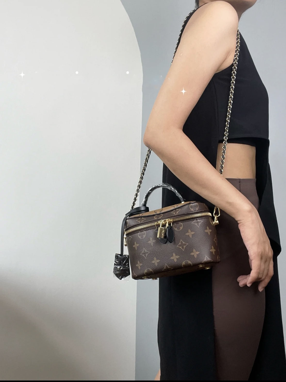 

Designer leather reading cosmetic bag European and American fashion printed handbag cosmetic bag slung chain bag, Brown