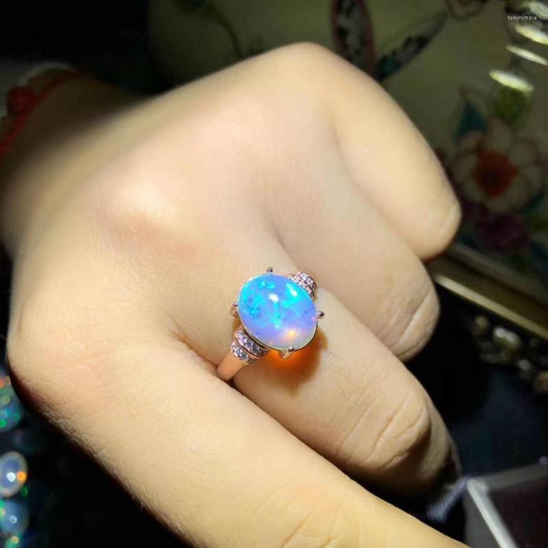 

Cluster Rings NATURAL ETHIOPIAN WELO FIRE OPAL CABOCHON Ring 10x12mm 1pc