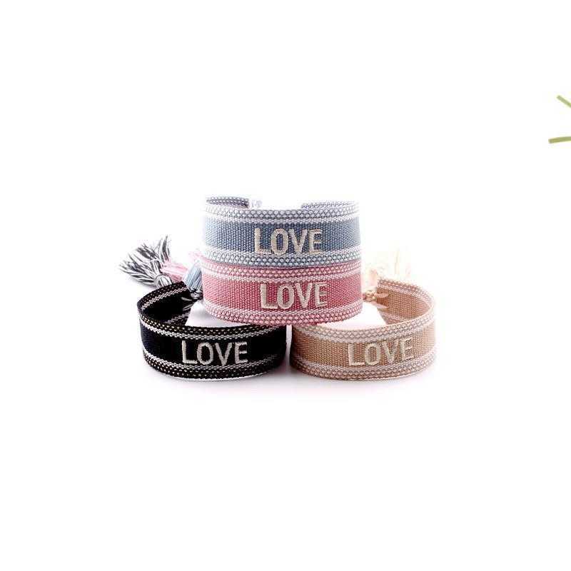 

Polyester Hand Woven Embroidery Letter Bracelet Cross Mirror Cheerleading Wrist Strap Source