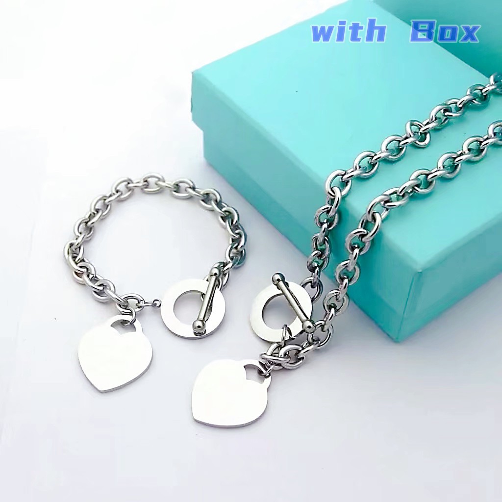 

Tiffansy Classic Designer Women's Peach Heart Necklace Bracelet Ice Cabinet Jewelry Classic Heart Set 18K Gold Girl Valentine's Day Gift 316L Stainless Steel with Box