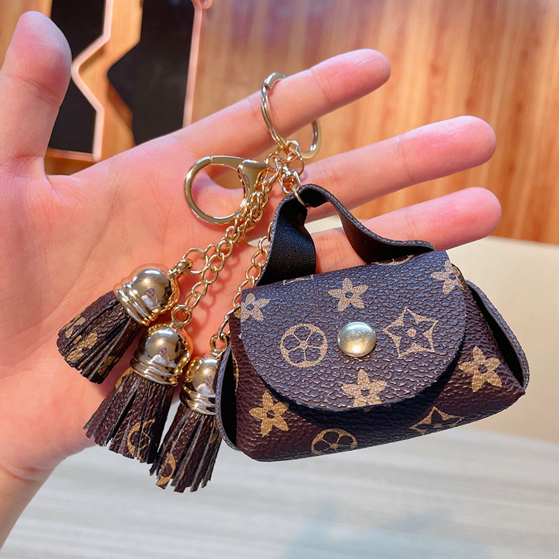 

Luxury Designer Leather Key Rings Brown Flower Plaid Tassel Coin Purse Keychains Holder Fashion Mini Storage Handbag Accessories Cute Bag Pendant Charms
