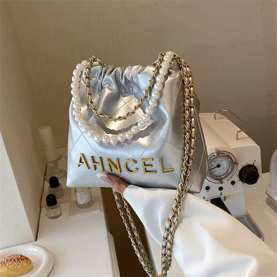 

13% OFF 2023 handbag Pearl Chain Small Xiangling Grid Bucket Fashion Trend Versatile One Shoulder Crossbody Bag for Women, White9