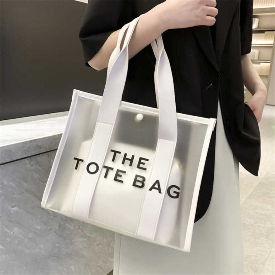

27% OFF 2023 Fashion handbag Fashionable Jelly Tote New Simple Style Hot Stamped THETOTEBAG Shoulder Bag for Women, White7