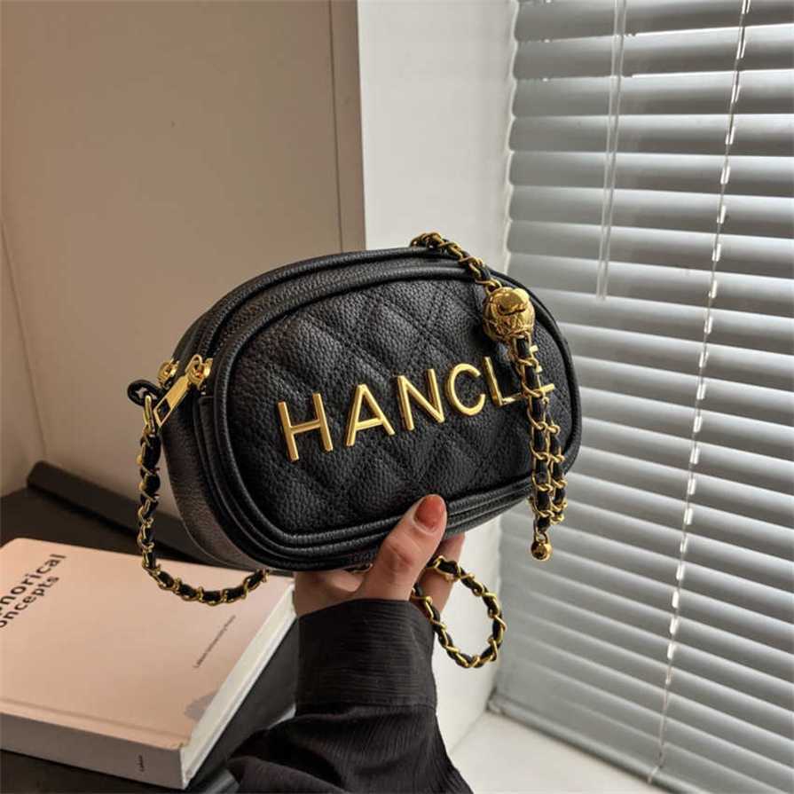 

17% OFF 2023 Fashion hand Lingge embroidery thread niche design new women's summer popular chain crossbody small round bag, Black pu shoulder strap