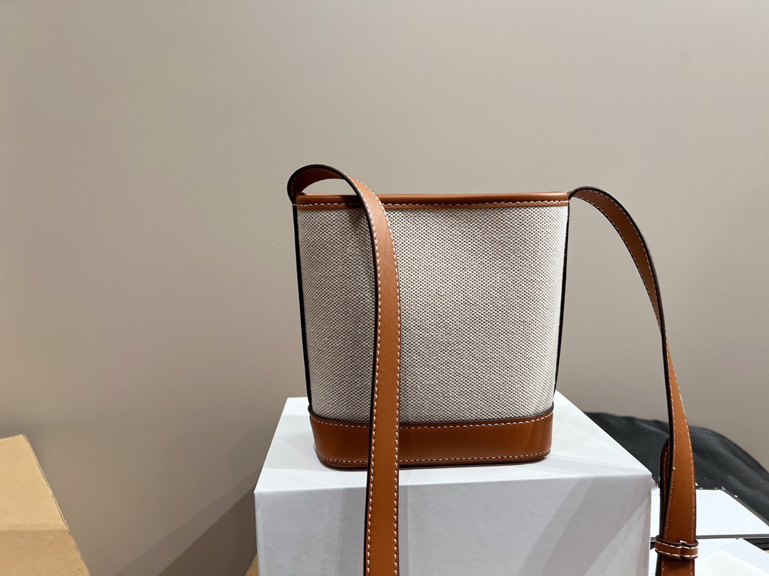 

Women's Bucket Shoulder Bag Triumphal Arch Leather Sewn High Capacity Vacation Bag Designer Luxury Shopping Bag ID royalfashion_bag, White