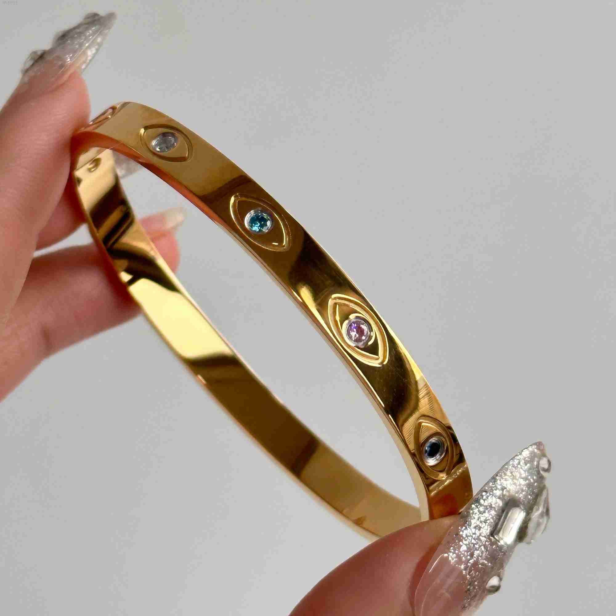 

2023 Dazan New Ins 18k Gold Plated Stainless Steel Eye of Prophecy Colored Zircon Polished Super Shine Bracelet for Women