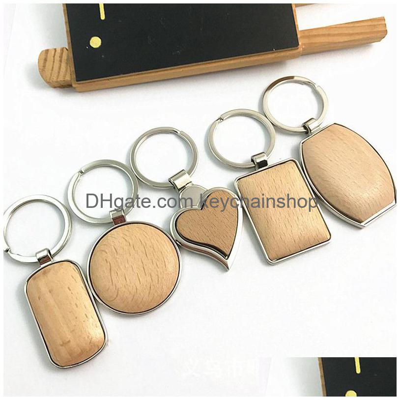 

Key Rings Creative Metal Wood Chain Wooden Small Pendant Heartshaped Elliptical Buckle Bag Car Party Favor Drop Delivery Jewelry Dhvvs