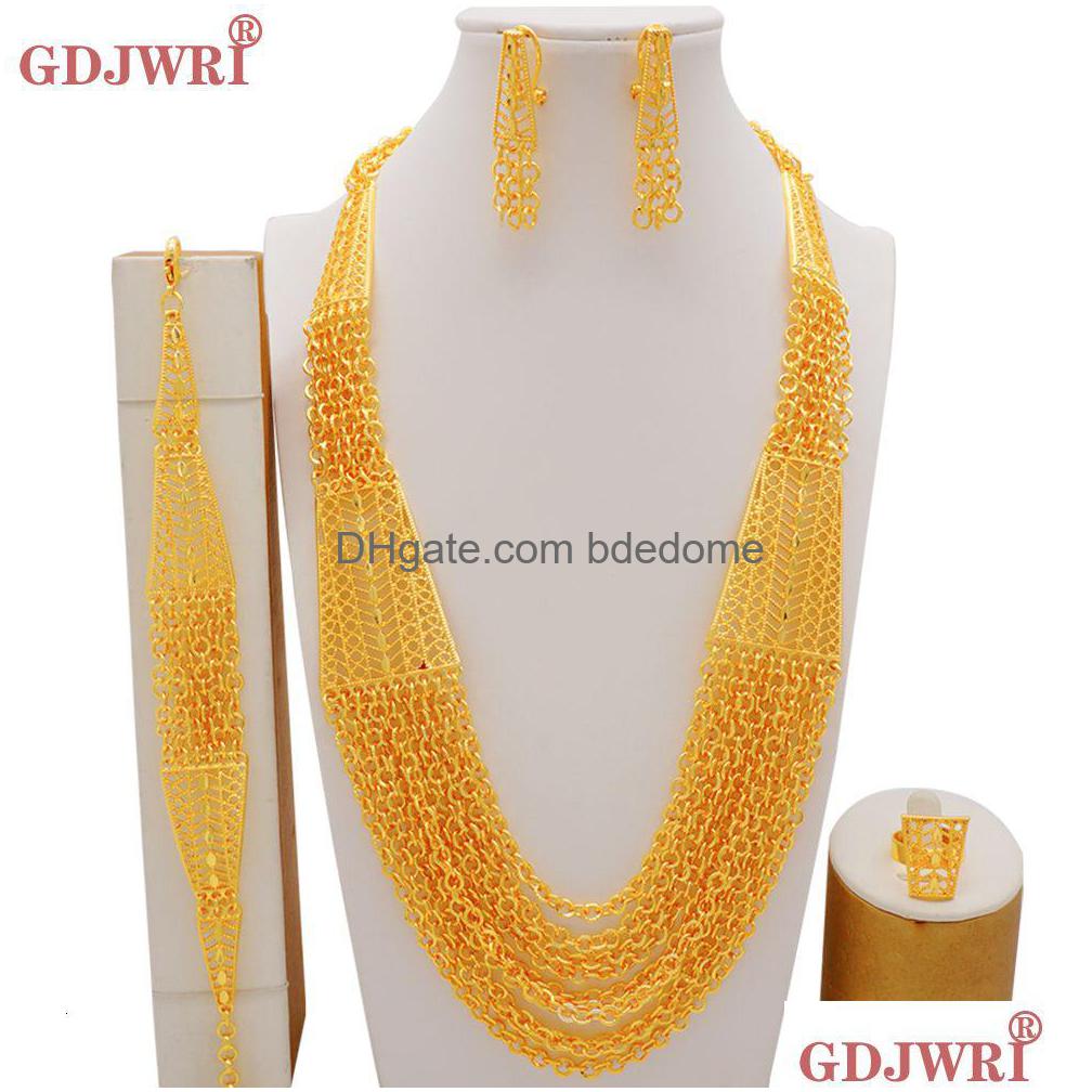 

Jewelry Sets Luxury African Dubai Gold Color Set For Women Tassel Necklace Bracelets Earrings Bohemia Indian Bridal Jeweller Dh8Pd