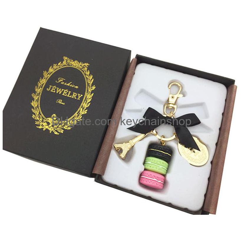 

Keychains Lanyards Fashion Party Gift Alloy Eiffel Tower Aron Cake Keychain Temperament Ladies Bag Decoration Car Key Ring With Bo Dhrgv