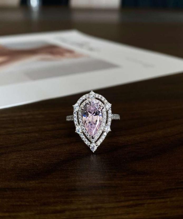 

HBP fashion Shipai pink water drop ring pear shaped 7 10 micro diamond cutout ring in Sterling Silver5910866