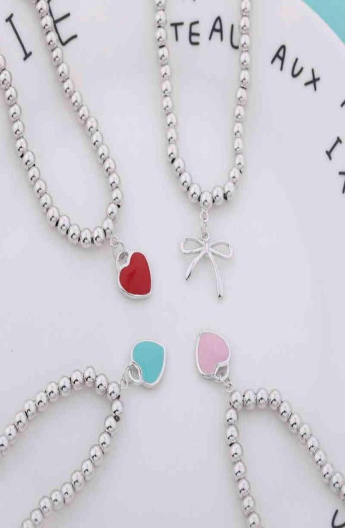 

S925 Sterling Silver fresh and versatile candy color bow love bracelet female red heart Ball Bracelet hand jewelry4746565