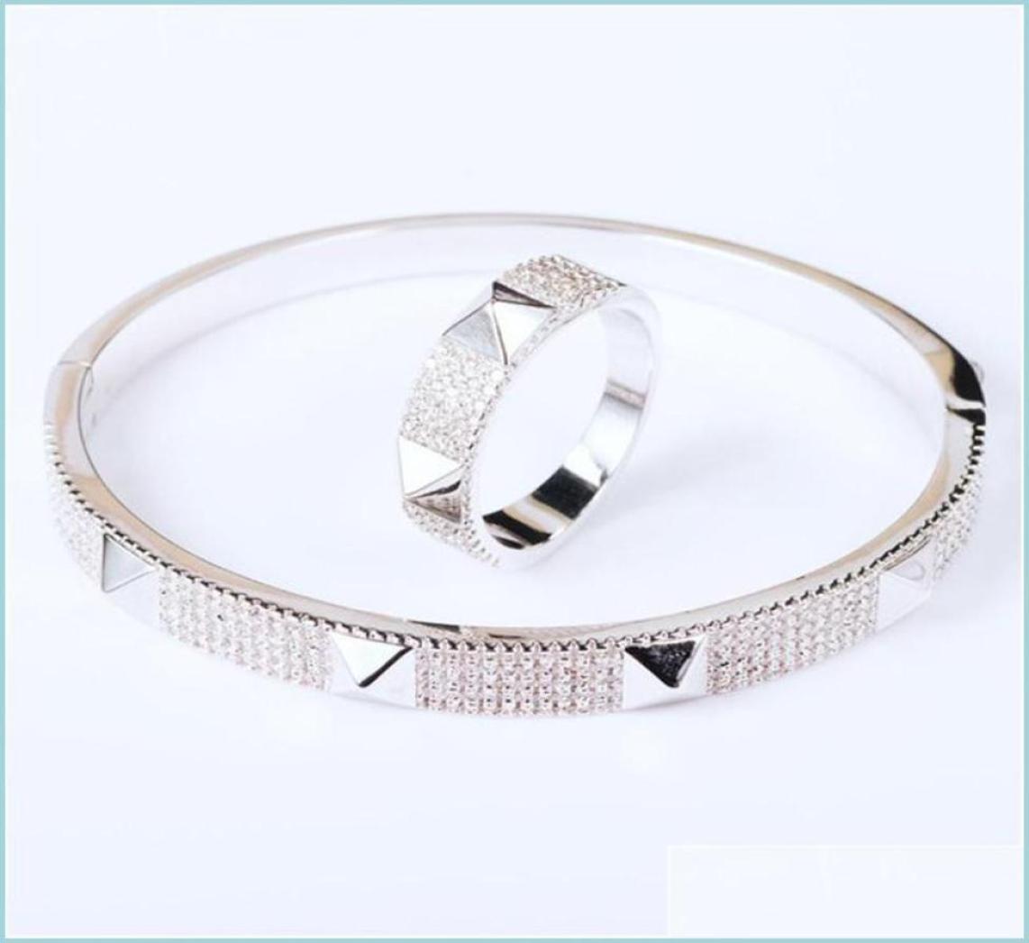 

Bangle Jewelry Fashion Exaggeration Classic Geometry Micro Inlaid Zirconia Bracelet Ring Set Womens Gift Drop Delivery 2022 Bracel8405316