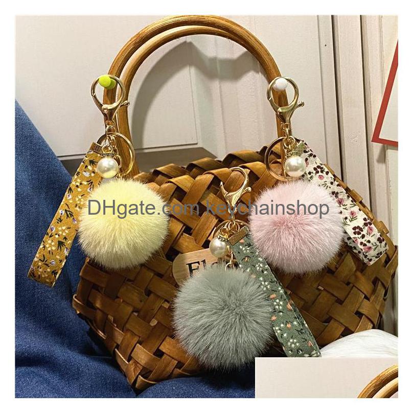 

Key Rings Mticolor Rabbit Fur Ball Keychain Favor Creative Floral Ribbon Keyring Cute Plush Bag Pendant Pearl Car Chain Accessories Dh3Zf