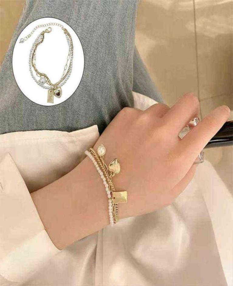 

Fashion Pearl Alloy Pendant Thick Chain Bracelet for Women Charm Love Bangle Party Jewelry Light Luxury9138076