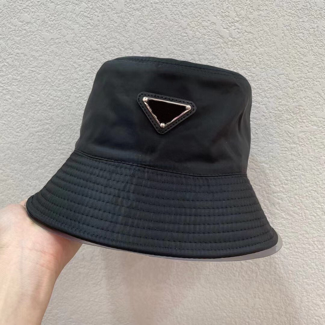 chapeau seau chapeau seau design Triangle logo tissu acrylique imperméable crème solaire chapeau de pêcheur dans une variété de couleurs