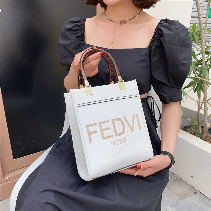 

50% OFF 2023 Fashion hand Net-red same portable Tote Fenjia printed women's new sense one-shoulder messenger bag, White6