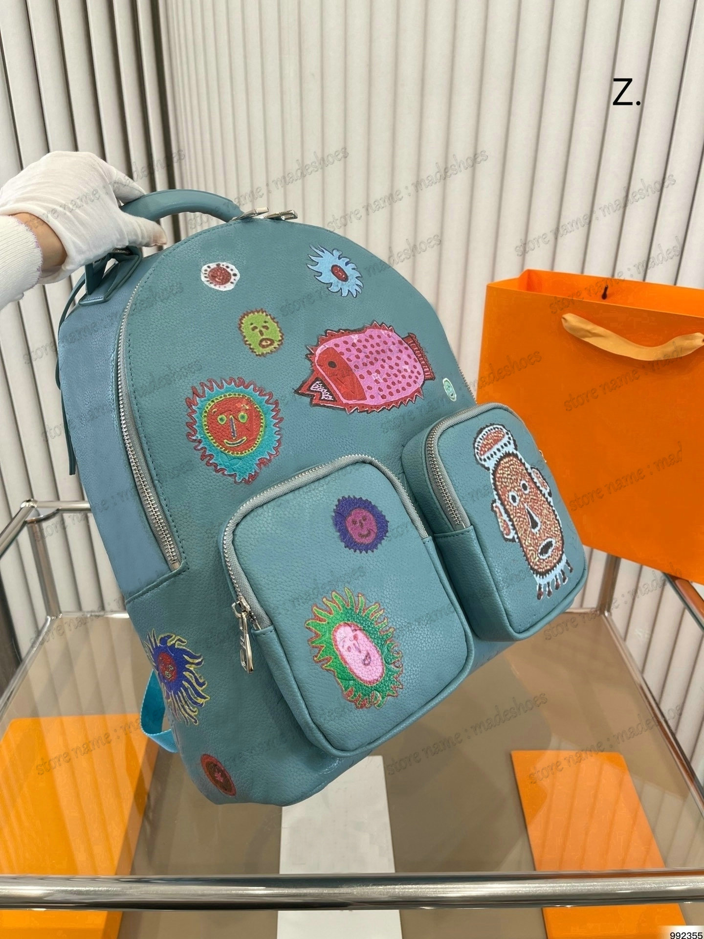 

Mens Blue Designer Backpack Clouds Colorful Faces YK Multipocket Backpacks Functional Backpack Luxurys School Bag M21714 Ink Watercolor 2023 Yayoi Kusama Bag, #2